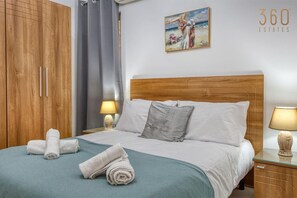 2 bedrooms, desk, iron/ironing board, travel cot