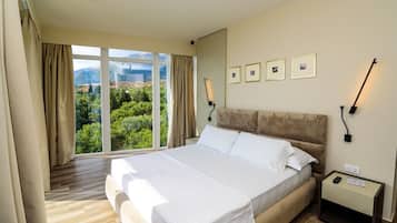 Deluxe Double Room, Balcony, River View | Minibar, free WiFi