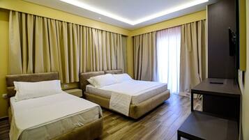 Comfort Triple Room, Balcony, Garden View | Minibar, free WiFi
