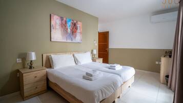 4 bedrooms, desk, iron/ironing board, travel cot