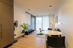 Superior Apartment, Balcony | Living area
