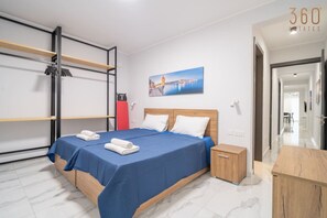 2 bedrooms, desk, iron/ironing board, travel crib