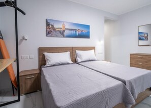 2 bedrooms, desk, iron/ironing board, travel crib