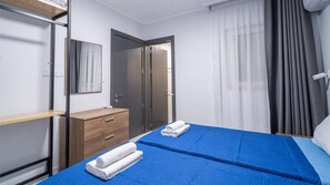 2 bedrooms, desk, iron/ironing board, travel crib