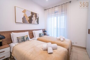 2 bedrooms, desk, iron/ironing board, travel crib