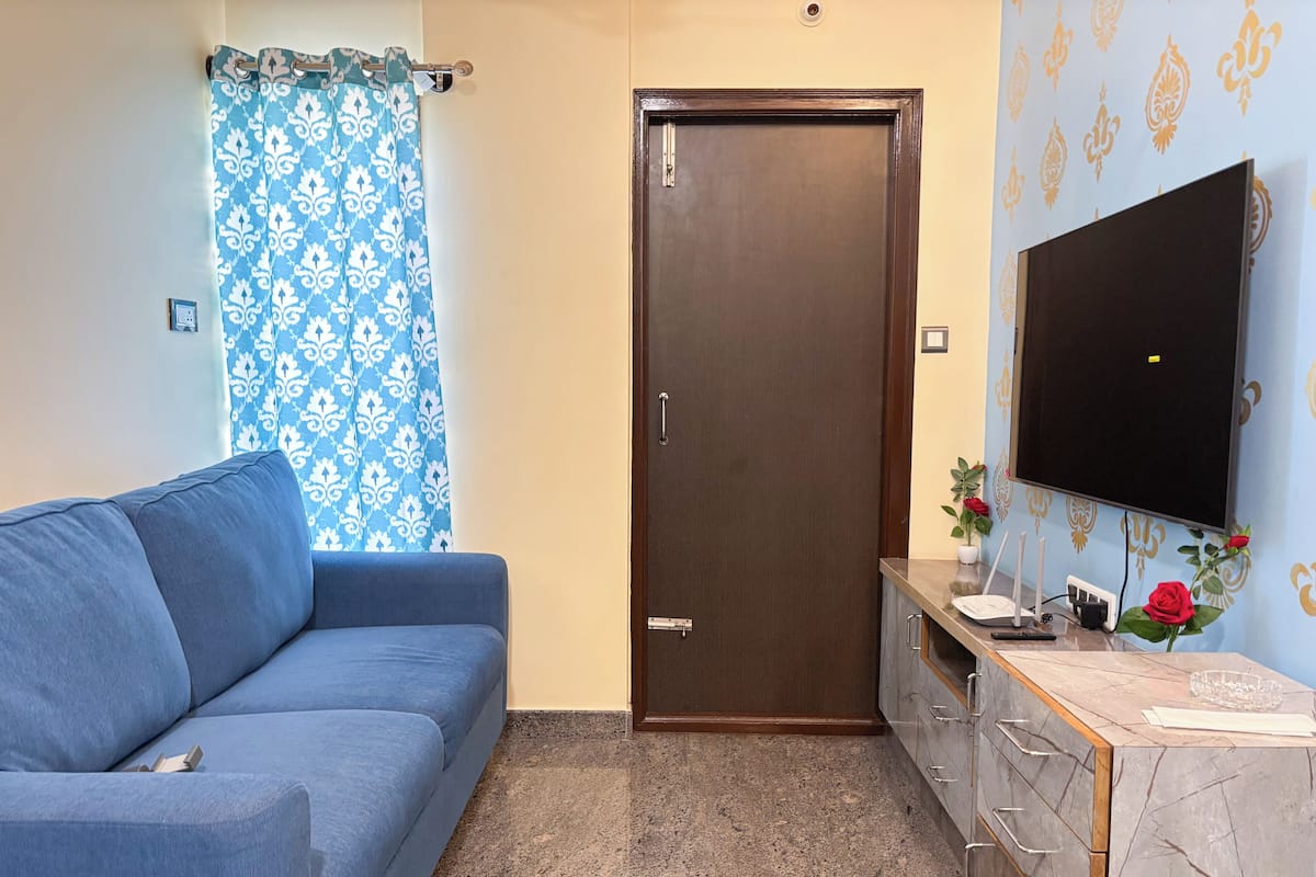Appartement Deluxe, vue ville | Coin séjour