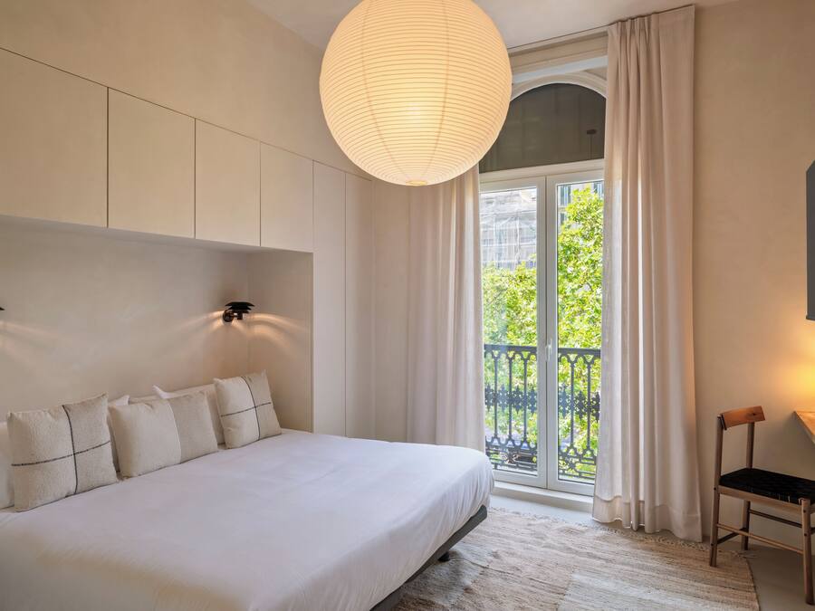 Double Room, Balcony, City View | In-room safe, blackout drapes, soundproofing, iron/ironing board