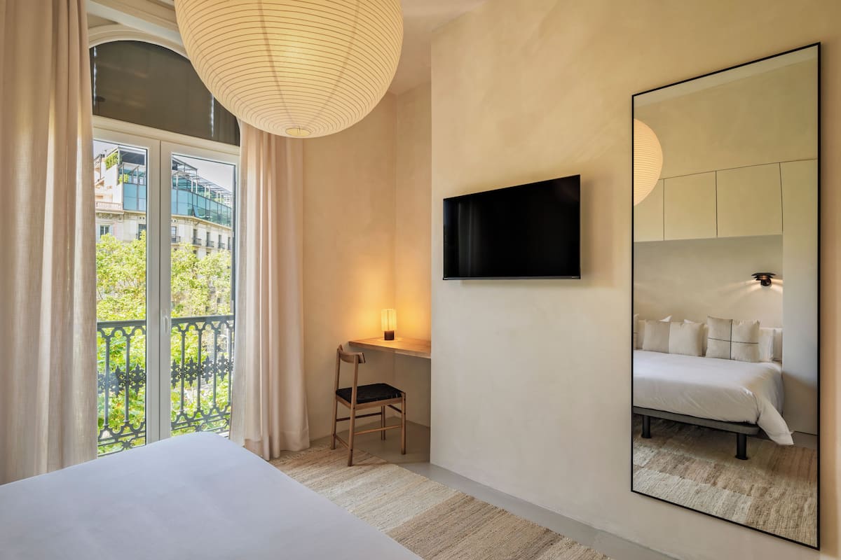 Double Room, Balcony, City View | In-room safe, blackout drapes, soundproofing, iron/ironing board
