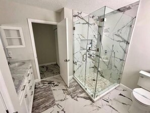 Hair dryer, towels, soap, shampoo