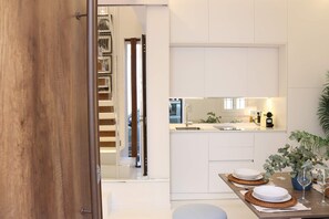 Casa (2 Bedrooms) | Cocina privada | Refrigerador, microondas, horno y lavavajillas 