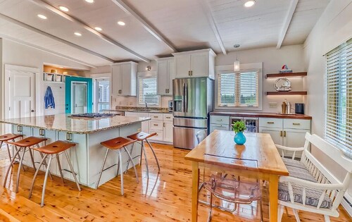 Bright and Modern Luxe on Long. Peloton bike in unit