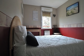 1 chambre, fer et planche Ă repasser, Wi-Fi, draps fournis