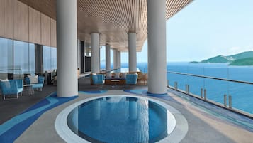 Indoor pool, open 9:00 AM to 7:00 PM, pool loungers, lifeguards on site