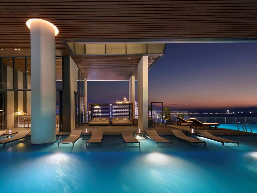 Indoor pool, open 9:00 AM to 7:00 PM, pool loungers, lifeguards on site