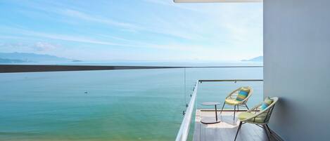 Deluxe Room, 1 King Bed, Ocean View | Terrace/patio