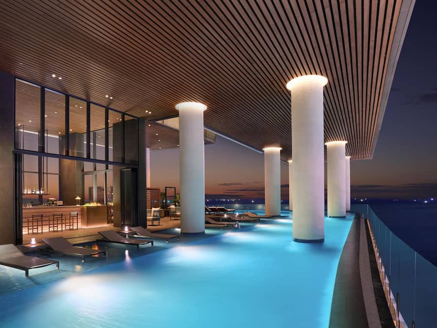 Indoor pool, open 9:00 AM to 7:00 PM, pool loungers, lifeguards on site