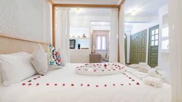 Luxury Suite, Courtyard View | In-room safe, iron/ironing board, free WiFi