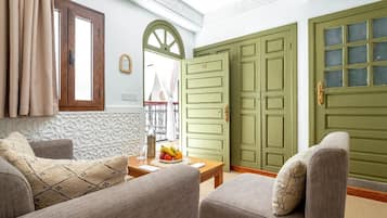 Luxury Suite, Courtyard View | In-room safe, iron/ironing board, free WiFi
