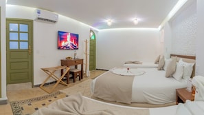 Family Quadruple Room, Courtyard View | In-room safe, iron/ironing board, free WiFi