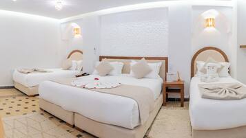 Family Quadruple Room, Courtyard View | Premium bedding, in-room safe, iron/ironing board, free WiFi