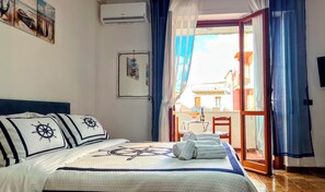 1 dormitorio, tabla de planchar con plancha, wifi gratis y ropa de cama
