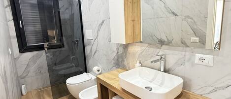 Hair dryer, towels, soap, shampoo