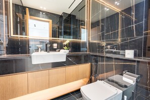 Shower, hair dryer, towels, soap