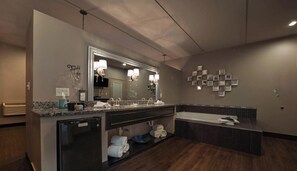 Jetted tub, hair dryer, towels, soap