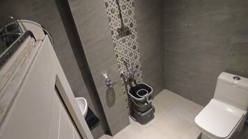 Shower, rainfall showerhead, towels, soap