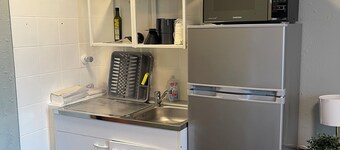 Modern business and travel apartment with kitchenette