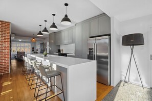Fridge, microwave, dishwasher, coffee/tea maker