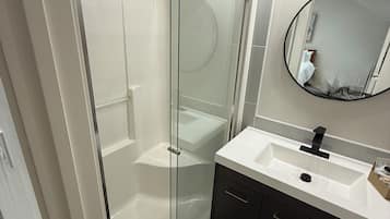 Hair dryer, towels, soap, shampoo