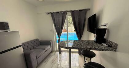 Room-condo Facing the Pool in the Heart