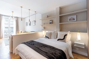 1 chambre, coffres-forts dans les chambres, fer et planche à repasser