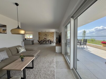 Luxurious Villa Möwengeflüster - 220sqm apartment for max. 8 guests + sauna by the lake