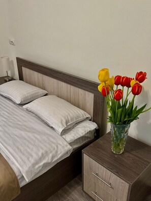 Premium bedding, down duvets, desk, laptop workspace