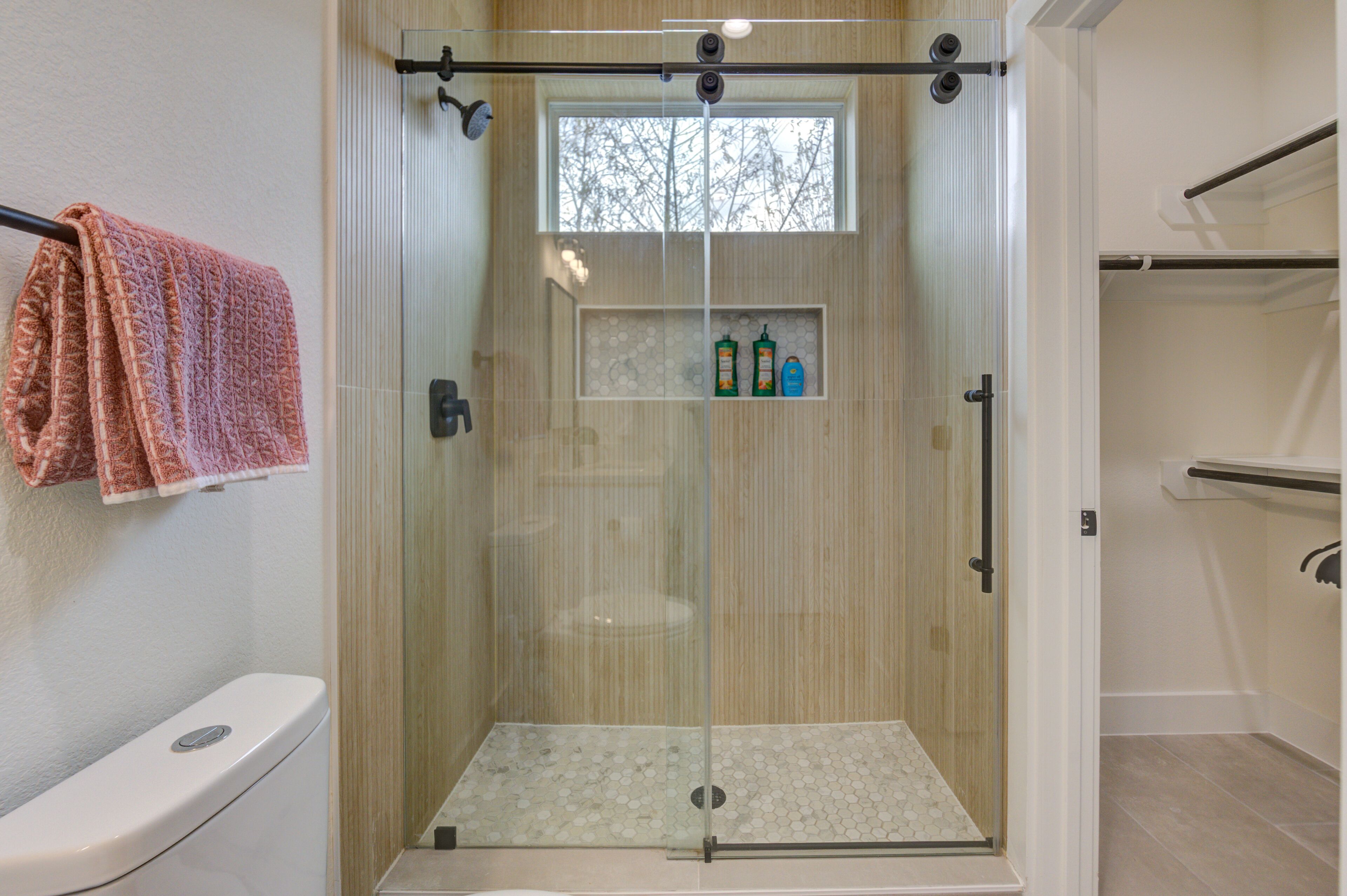 Shower, hair dryer, towels, soap