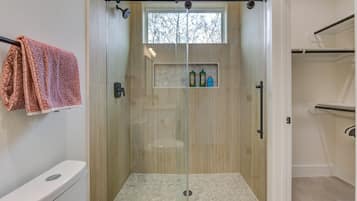 Shower, hair dryer, towels, soap