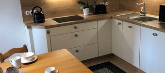 60 sqm apartment on the ground floor with garden and courtyard for 2 people