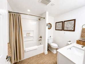Shower, eco-friendly toiletries, hair dryer, towels
