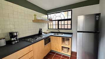 Fridge, microwave, coffee/tea maker, toaster