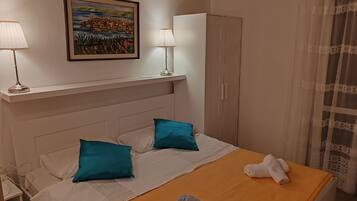Apartment (One Bedroom Apartment with Balcony an) | 4 bedrooms, cribs/infant beds, free WiFi