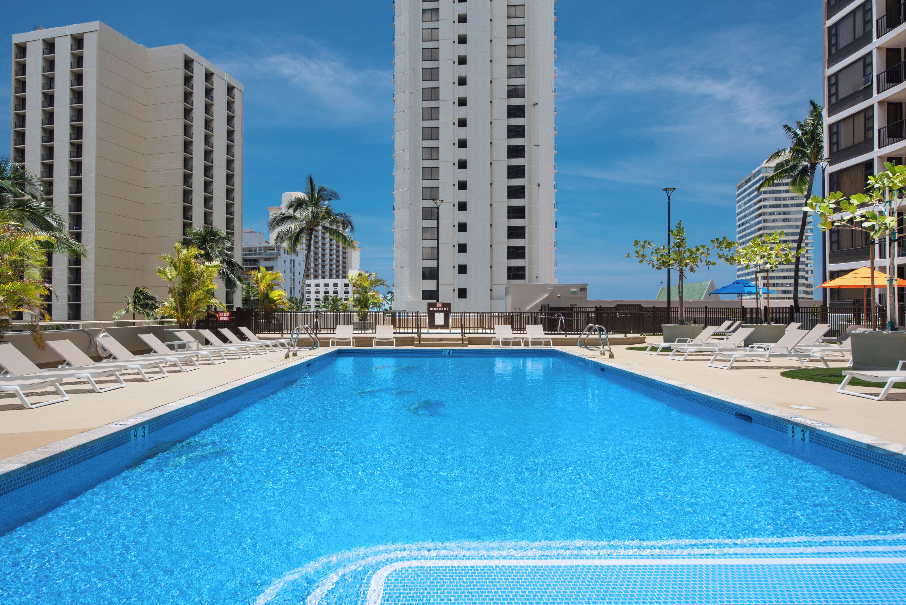 Outdoor pool, open 8:00 AM to 9:00 PM, pool loungers