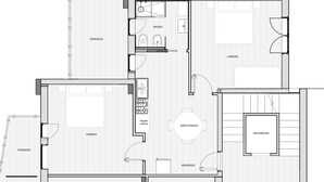 A floor plan of a hotel with multiple rooms, a kitchen, a bathroom, and a terrace area.
