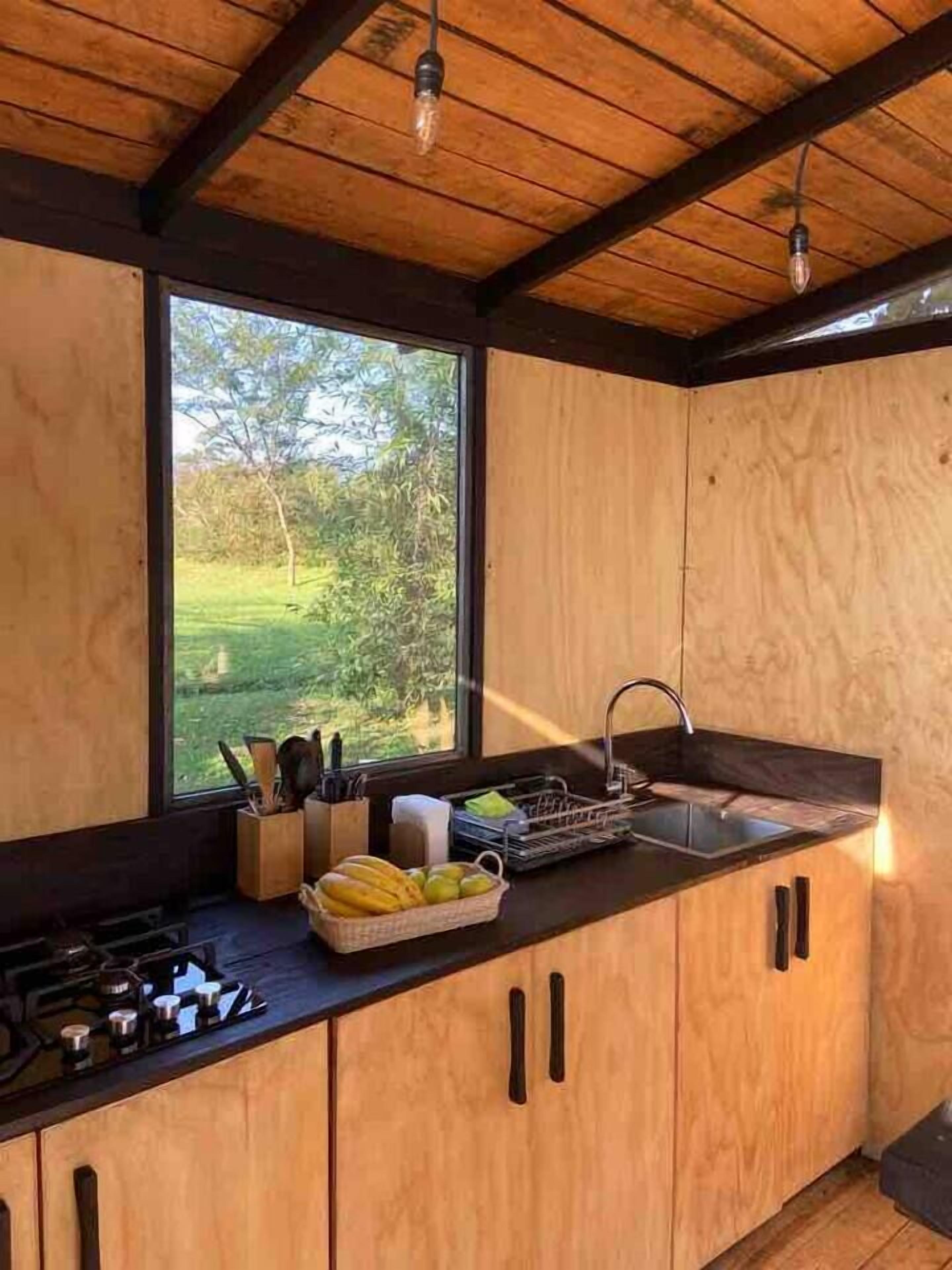 Fridge, stovetop, coffee/tea maker, cookware/dishes/utensils