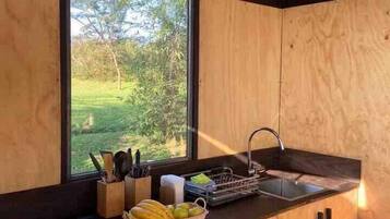 Fridge, stovetop, coffee/tea maker, cookware/dishes/utensils