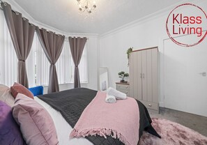 Iron/ironing board, travel crib, free WiFi, bed sheets
