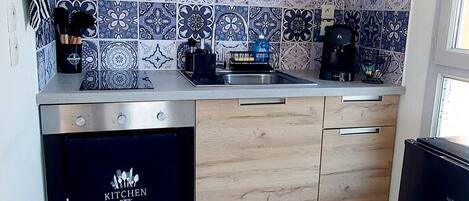 Refrigerador, microondas, horno y parrilla de estufa