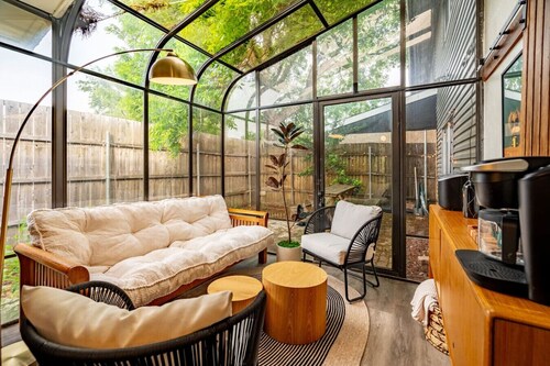 Sunlit Designer Home with Tranquil Sunroom Space