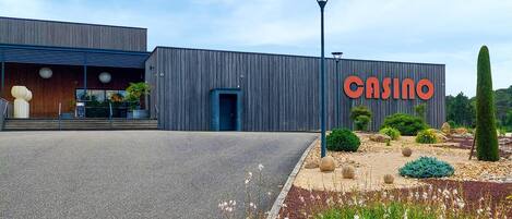 A modern building with a prominent "CASINO" sign.
